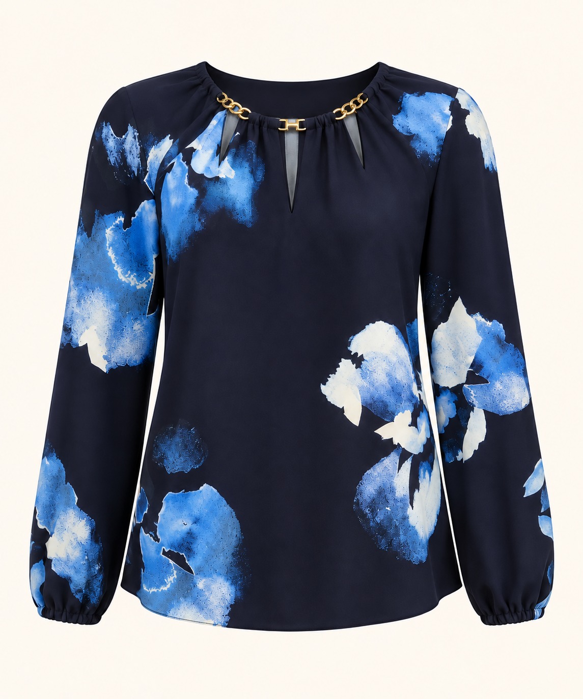 Blusa floral azul marino con cadena