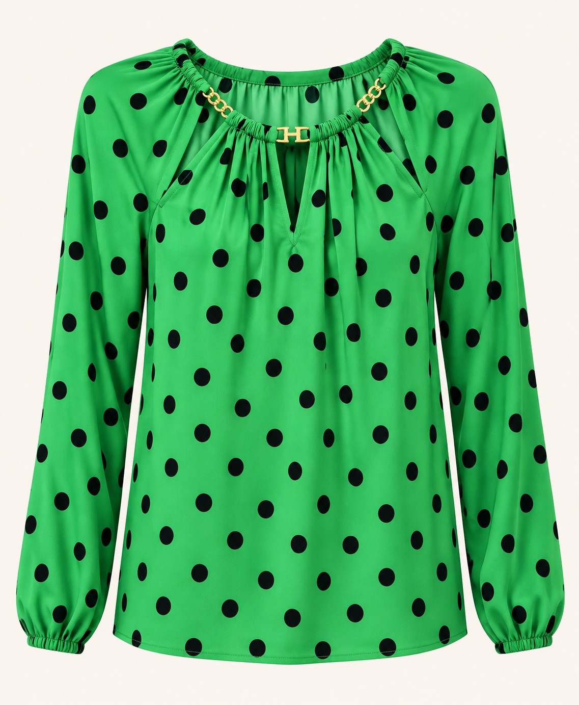 Blusa verde de lunares con detalle dorado